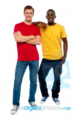 Smiling Casual Young Guys Standing Stock Photo