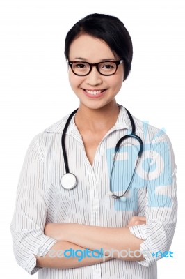 Smiling Confident Female Doctor Stock Photo