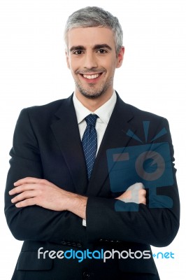 Smiling Confident Mature Businessman Stock Photo