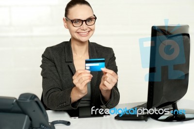 Smiling Corporate Lady Showing Credit Card Stock Photo