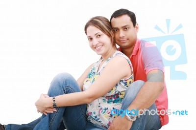 Smiling Couple Sitting Stock Photo