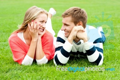 Smiling Couples Looking Each Other Stock Photo