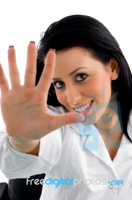 Smiling Doctor Showing Palm Stock Photo