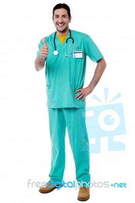 Smiling Doctor Showing Thumbs Up Stock Photo