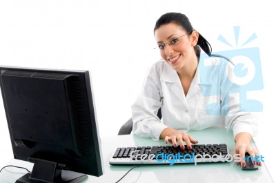 Smiling Doctor Working In Computer Stock Photo