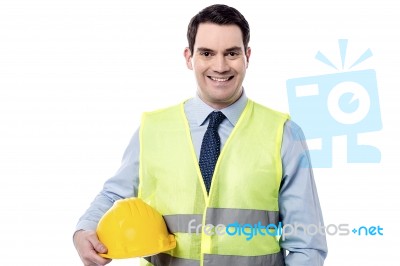 Smiling Engineer With Safety Helmet Stock Photo