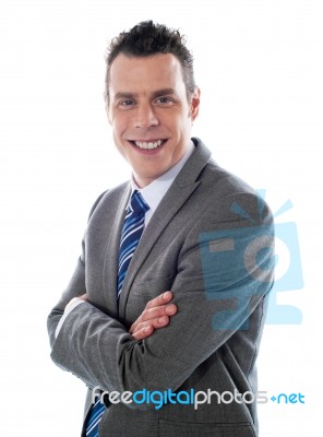 Smiling Executive, Arms-folded Stock Photo