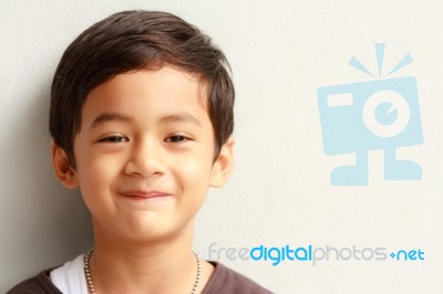 Smiling Face Of Asian Young Boy Stock Photo