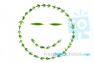 Smiling Face With Gooks Made Of Hemp Leaves Stock Photo