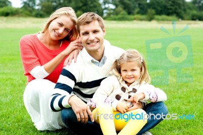 Smiling Family In Outdoors Stock Photo