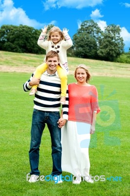 Smiling Family In Outdoors Stock Photo