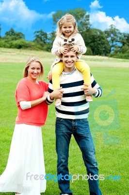 Smiling Family In Outdoors Stock Photo