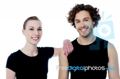 Smiling Fashion Couple In Casuals Stock Photo