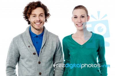 Smiling Fashion Couple Posing Together Stock Photo