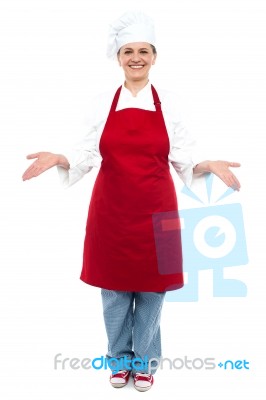 Smiling Female Chef Standing Stock Photo