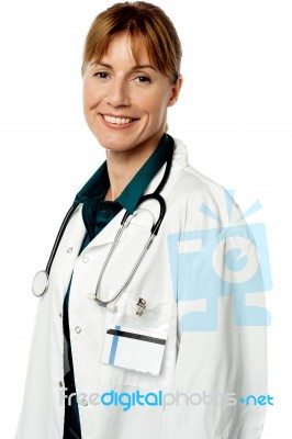 Smiling Female Doctor At Work Stock Photo