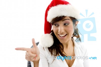 Smiling Female Pointing Sideways Stock Photo