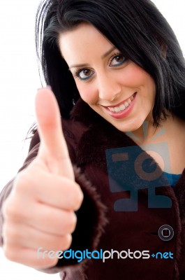 Smiling Female Showing Thumbs Up Stock Photo