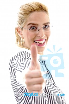 Smiling Female With Thumbs Up Stock Photo