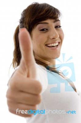 Smiling Female With Thumbs Up Stock Photo