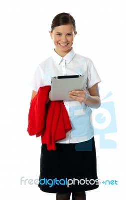 Smiling Girl Holding Tablet Pc Stock Photo