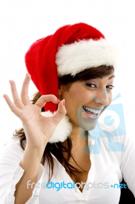 Smiling Girl Showing Okay Gesture Stock Photo