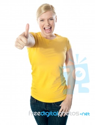 Smiling Girl Showing Thumbs-up Stock Photo