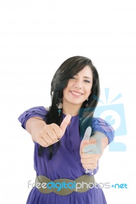 Smiling Girl Showing Thumbs Up Stock Photo