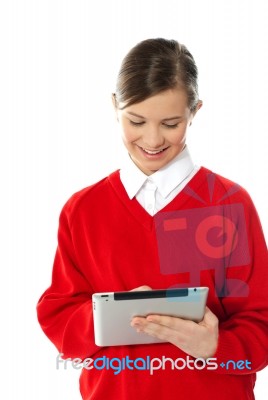 Smiling Girl Using Tablet Pc Stock Photo