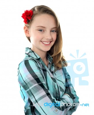 Smiling Girl wearing rose On Head Stock Photo