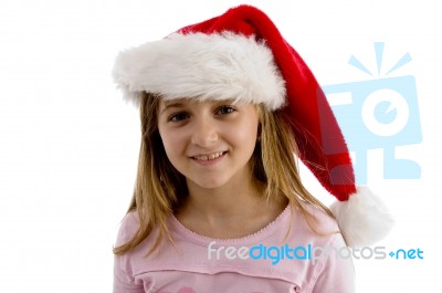 Smiling Girl Wearing Santa Hat Stock Photo