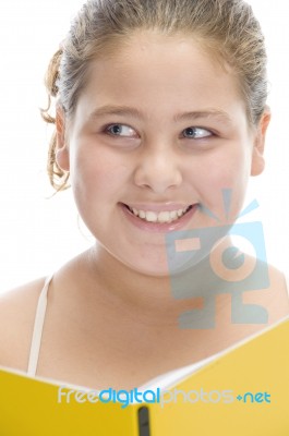 Smiling Girl With notebook Stock Photo