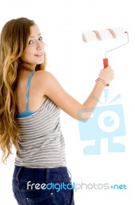 smiling Girl With Roller Brush Stock Photo