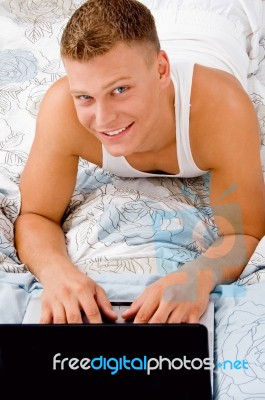 Smiling Guy Posing With Notebook Stock Photo