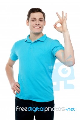 Smiling Guy With An Excellent Gesture Stock Photo