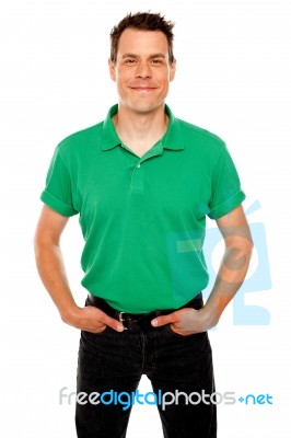 Smiling Guy With Hands In Pocket Stock Photo