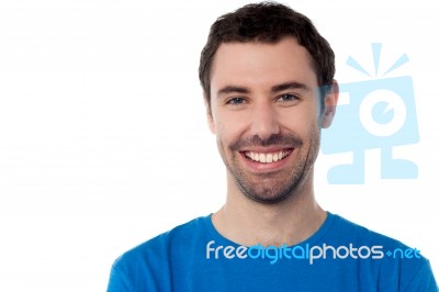 Smiling Handsome Guy Isolated Over White Stock Photo