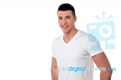 Smiling Handsome Guy Isolated Over White Stock Photo