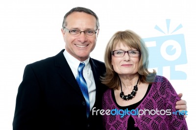 Smiling Happy Senior Couple Posing Stock Photo