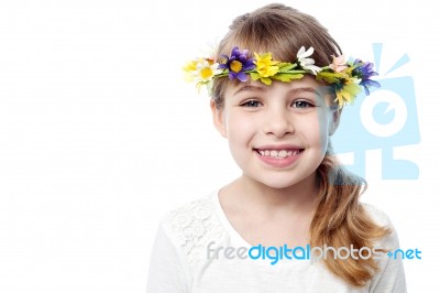 Smiling Kid Wearing Flower Wreath Stock Photo