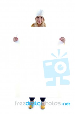 smiling lady showing blank notice Stock Photo