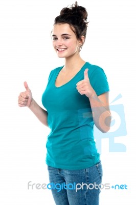 Smiling Lady Showing Thumbs Up Stock Photo