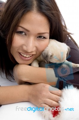 Smiling Lady With Hat And Puppy Stock Photo