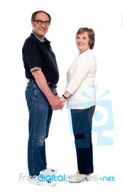 Smiling Love Couple Holding Hands Stock Photo