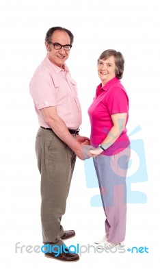 Smiling Love Couple Holding Hands Stock Photo