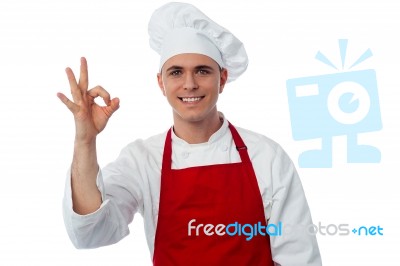 Smiling Male Chef Showing Ok Sign Stock Photo