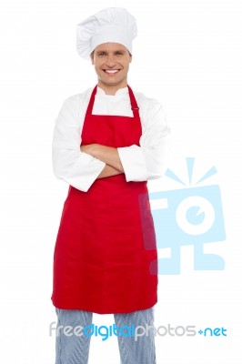 Smiling Male Chef With Arms Crossed Stock Photo