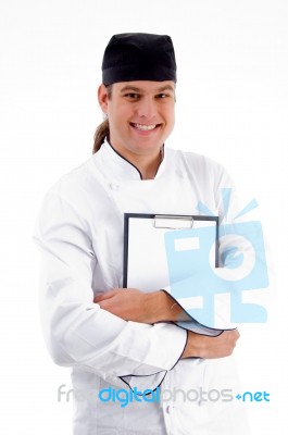 Smiling Male chef with clipboard Stock Photo