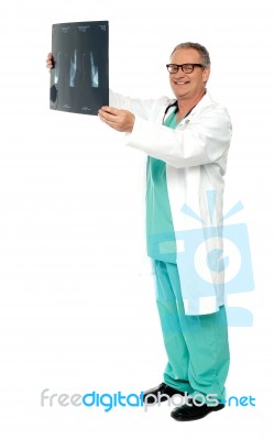 Smiling Male Doctor Holding X Ray Stock Photo