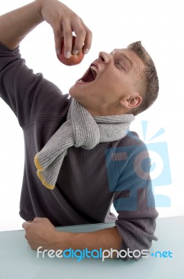 Smiling Male Going To Eat Apple Stock Photo